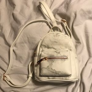 Marble and rose gold mini backpack/shoulder bag.
